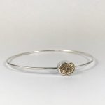 Pulsera de plata con detalle central antiguo ornamentado