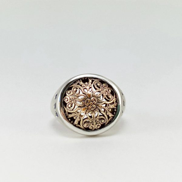 Silver signet ring with antique detail and blue sapphires