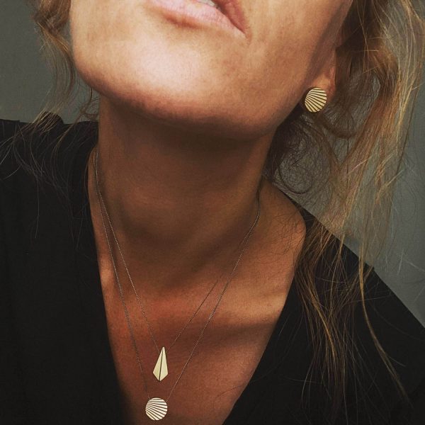 Arracades rodones de plata xapada en or amb disseny geomètric Art Déco